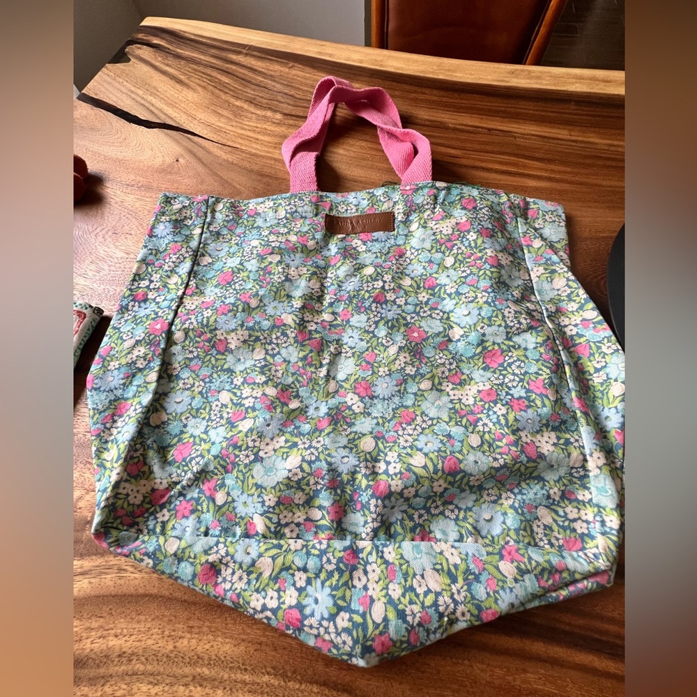 Two Tote Bags - one floral and one vegetable.